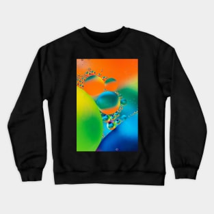 Colorful close up of oil drops in water Crewneck Sweatshirt